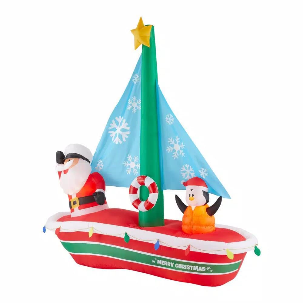 Home Accents Holiday 7 ft. Pre-Lit LED Inflatable Santa in Sailboat with Penguin Christmas Decoration