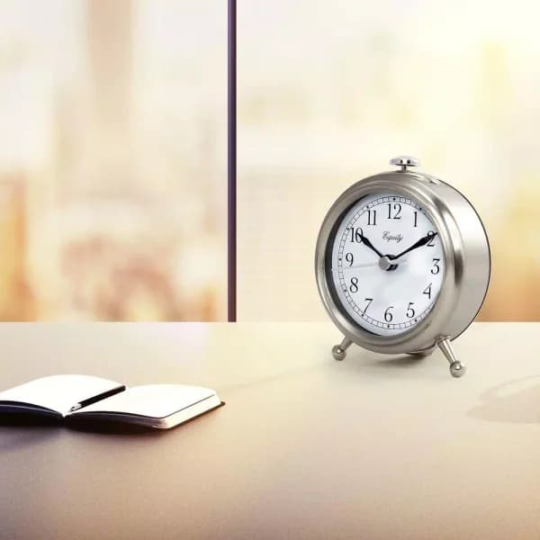 Equity by La Crosse Small 3 in. Metal Quartz Analog Alarm Table Clock with Lighted Dial - Silver