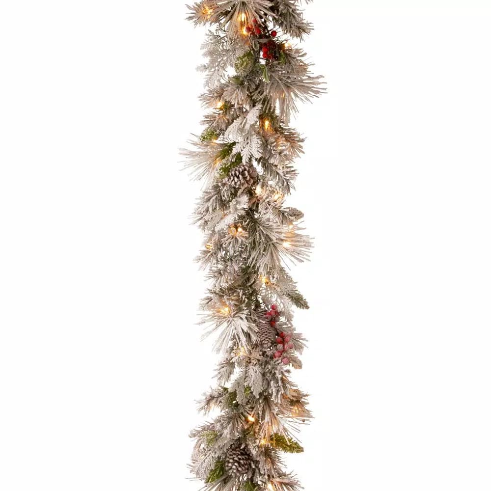 National Tree Company 9 ft. Snowy Bedford Pine Garland with Red Berries, Pinecones & Warm White LED Lights